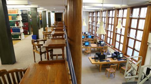 Top view of study desks and PCs inside main reading room of Health Sciences Library